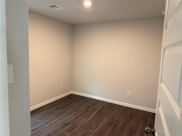 13305 Burbot Dr, Conroe, TX 77384 - unfurnished room with dark wood-style floors and recessed lighting