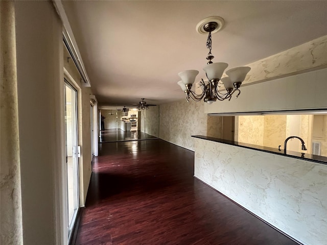 14515 Wunderlich Dr Unit 708, Houston, TX 77069 - unfurnished dining area with wood finished floors and a chandelier