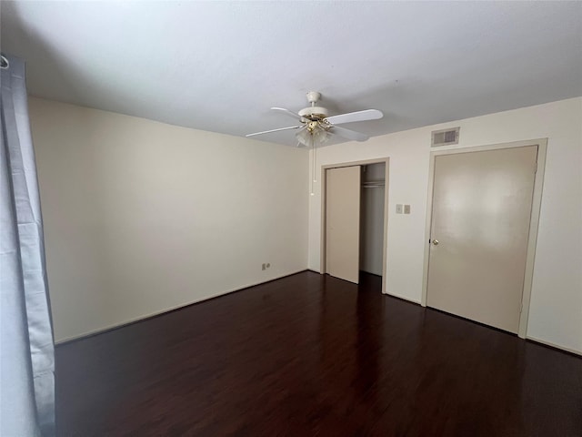 14515 Wunderlich Dr Unit 708, Houston, TX 77069 - unfurnished bedroom featuring dark wood-style floors, a closet, and a ceiling fan