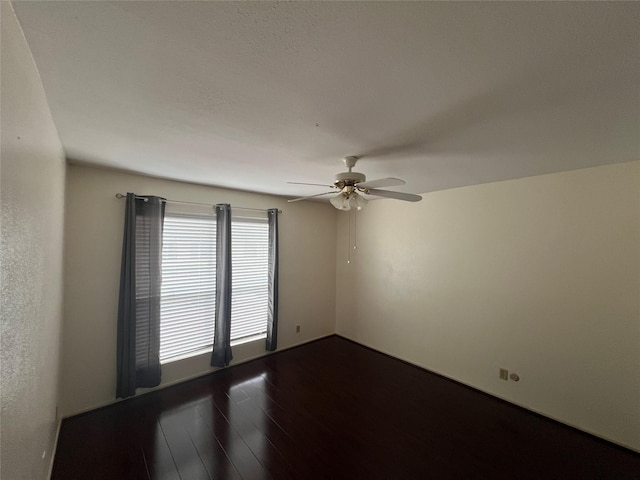 14515 Wunderlich Dr Unit 708, Houston, TX 77069 - empty room with a ceiling fan and dark wood-style floors