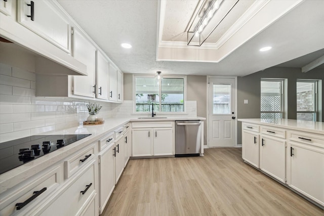 3114 Wagon Trail Dr, Sugar Land, TX 77479 - kitchen featuring stainless steel dishwasher, backsplash, white cabinetry, and recessed lighting