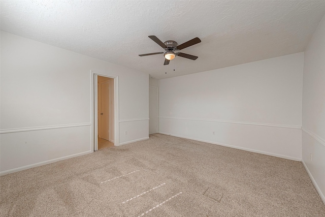 2510 Wind Fall Ln, Sugar Land, TX 77479 - unfurnished room featuring ceiling fan, light carpet, and a textured ceiling