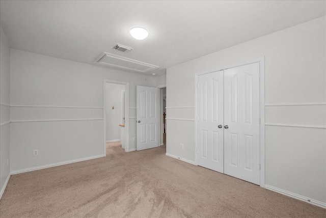 1427 Roaring Springs Ln, Seabrook, TX 77586 - unfurnished bedroom featuring attic access, carpet floors, and a closet