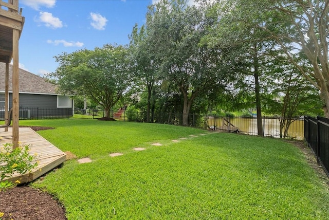 1427 Roaring Springs Ln, Seabrook, TX 77586 - fenced backyard with a deck with water view