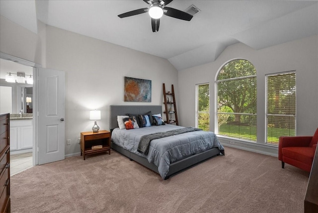 1427 Roaring Springs Ln, Seabrook, TX 77586 - bedroom with light carpet, lofted ceiling, connected bathroom, and a ceiling fan