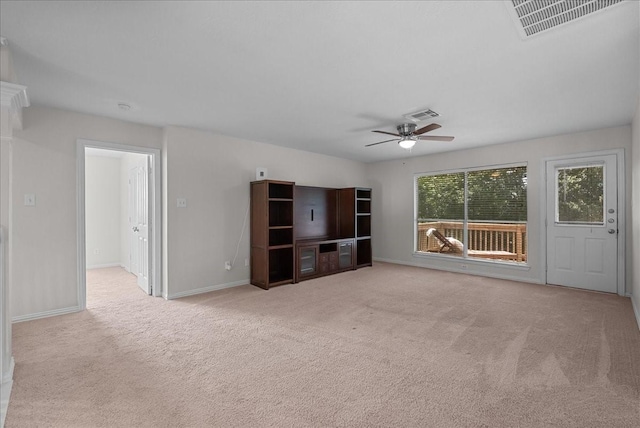 1427 Roaring Springs Ln, Seabrook, TX 77586 - unfurnished living room featuring carpet floors and ceiling fan