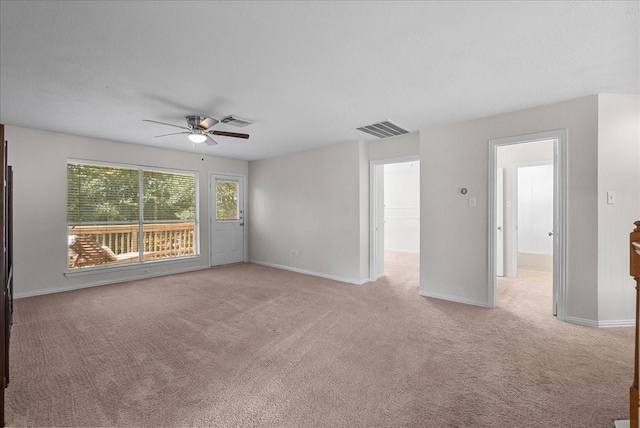 1427 Roaring Springs Ln, Seabrook, TX 77586 - empty room featuring light colored carpet and ceiling fan