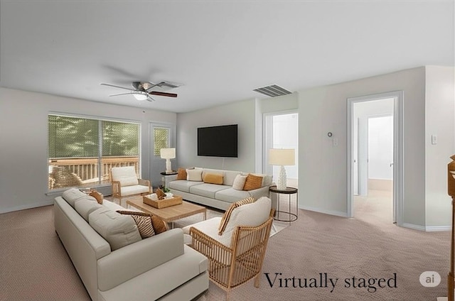 1427 Roaring Springs Ln, Seabrook, TX 77586 - living area featuring light carpet and ceiling fan