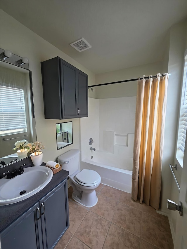 9714 Coyote Creek Dr, Houston, TX 77095 - full bath with vanity, shower / bath combo with shower curtain, and tile patterned floors
