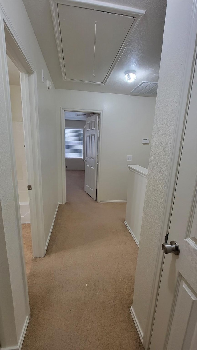 9714 Coyote Creek Dr, Houston, TX 77095 - hall featuring attic access and carpet flooring