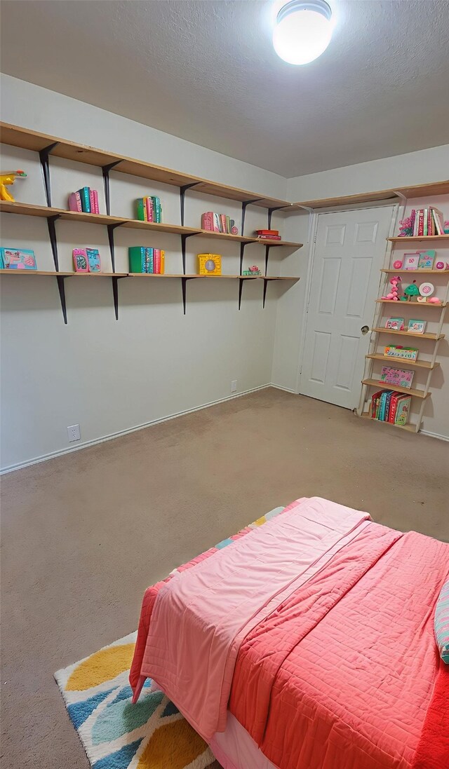9714 Coyote Creek Dr, Houston, TX 77095 - carpeted bedroom featuring a textured ceiling