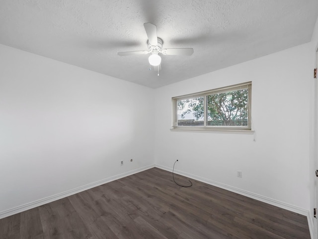 1406 Chippawa Ln, Pasadena, TX 77504 - spare room with dark wood-type flooring, a ceiling fan, and a textured ceiling