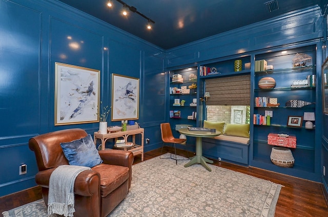 987 S Post Oak Ln, Houston, TX 77056 - office with ornamental molding, wood finished floors, and a decorative wall