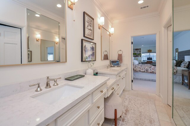 987 S Post Oak Ln, Houston, TX 77056 - ensuite bathroom featuring ornamental molding, vanity, tile patterned floors, and recessed lighting