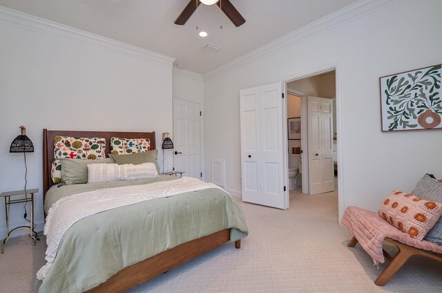 987 S Post Oak Ln, Houston, TX 77056 - bedroom with ornamental molding, light carpet, a ceiling fan, and ensuite bathroom