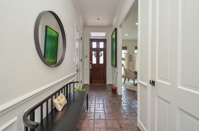987 S Post Oak Ln, Houston, TX 77056 - entryway with ornamental molding, brick floors, and recessed lighting