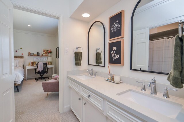 987 S Post Oak Ln, Houston, TX 77056 - ensuite bathroom with double vanity and ornamental molding