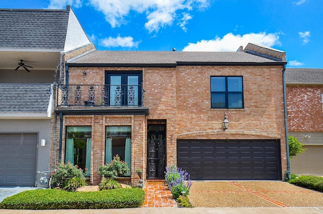 987 S Post Oak Ln, Houston, TX 77056 - view of front facade featuring a balcony, a garage, brick siding, and a shingled roof