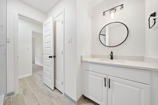10219 Weldon Rd, Freeport, TX 77541 - bathroom with vanity and baseboards