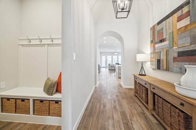 1523 Carson Field Ln, Richmond, TX 77469 - hall featuring wood finished floors and arched walkways
