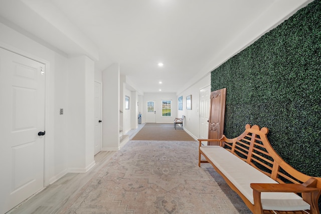 710 93rd St, Galveston, TX 77554 - corridor with an accent wall, baseboards, light wood-style floors, and recessed lighting