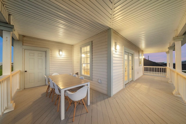 710 93rd St, Galveston, TX 77554 - wooden terrace featuring outdoor dining area