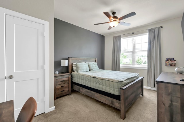 12330 Castano Creek Dr, Humble, TX 77346 - bedroom with light carpet and a ceiling fan