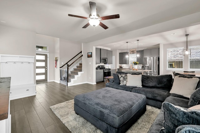 12330 Castano Creek Dr, Humble, TX 77346 - living room featuring dark wood-style flooring, ceiling fan, stairs, and recessed lighting