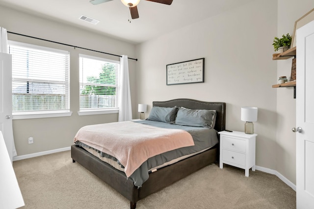 12330 Castano Creek Dr, Humble, TX 77346 - bedroom with light colored carpet and ceiling fan