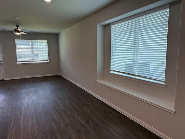13308 Burbot Dr, Conroe, TX 77384 - unfurnished room featuring dark wood-type flooring and ceiling fan