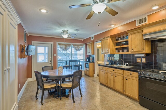1103 N Hunting Tower Run, Conroe, TX 77316 - kitchen with stainless steel gas stove, a ceiling fan, open shelves, backsplash, and tile counters