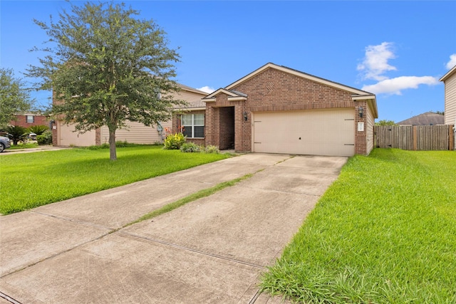 4710 Palm Park Ln, Richmond, TX 77469 - view of front facade featuring brick siding, driveway, and an attached garage