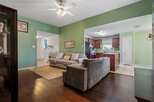 4710 Palm Park Ln, Richmond, TX 77469 - living room featuring ceiling fan and light wood-style floors