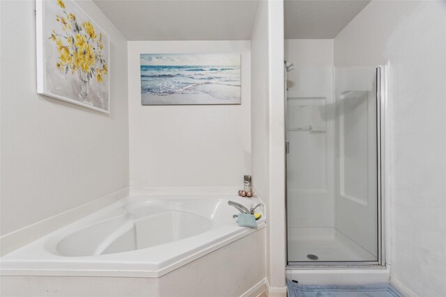 4710 Palm Park Ln, Richmond, TX 77469 - full bathroom featuring a shower stall and a bath