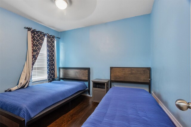 4710 Palm Park Ln, Richmond, TX 77469 - bedroom with wood finished floors and ceiling fan