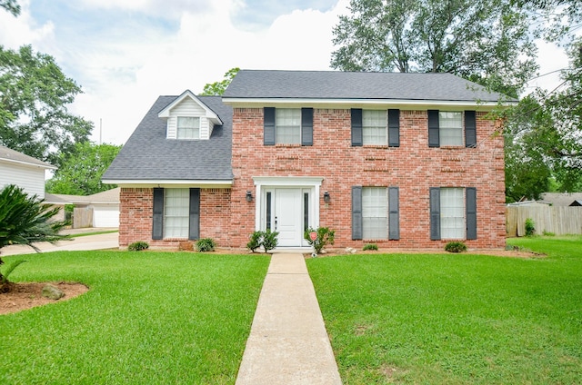 9719 Kindletree Dr, Houston, TX 77040 - colonial inspired home with brick siding and a shingled roof
