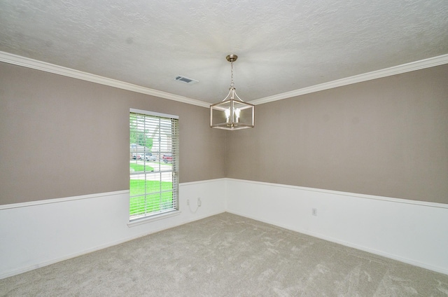9719 Kindletree Dr, Houston, TX 77040 - carpeted empty room with a chandelier, ornamental molding, and a textured ceiling