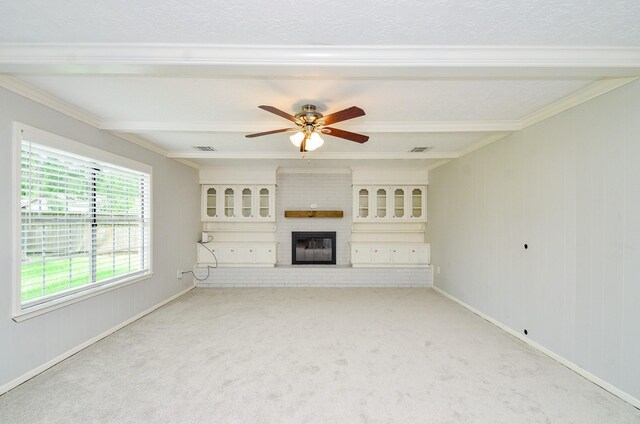 9719 Kindletree Dr, Houston, TX 77040 - unfurnished living room with a ceiling fan, ornamental molding, a brick fireplace, and carpet