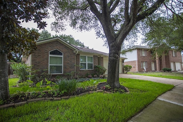 20422 Linden Tree Dr, Katy, TX 77449 - view of front of property featuring brick siding, driveway, and a garage