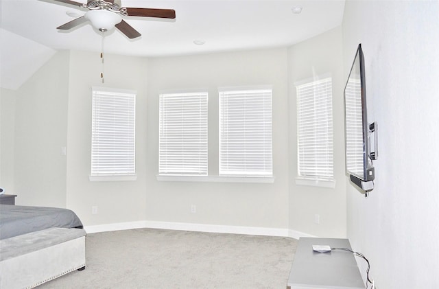 9323 Stablewood Lakes Ln, Tomball, TX 77375 - carpeted bedroom with baseboards and a ceiling fan