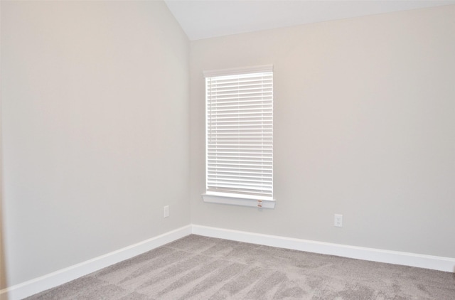 9323 Stablewood Lakes Ln, Tomball, TX 77375 - carpeted spare room featuring lofted ceiling and plenty of natural light