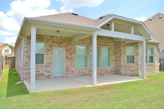 9323 Stablewood Lakes Ln, Tomball, TX 77375 - rear view of house with brick siding, a patio area, and a shingled roof