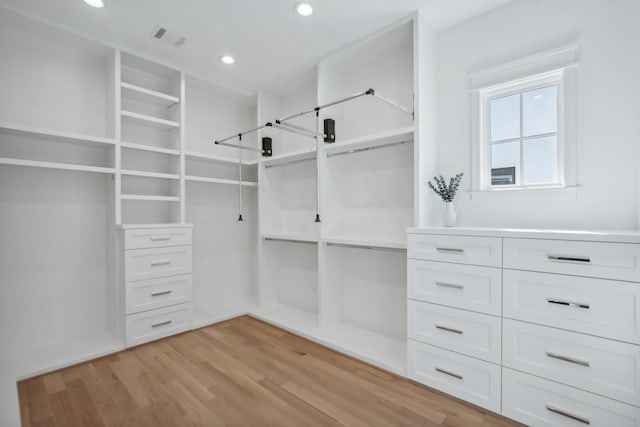 2708 Morrison St, Houston, TX 77009 - walk in closet with light wood-style floors