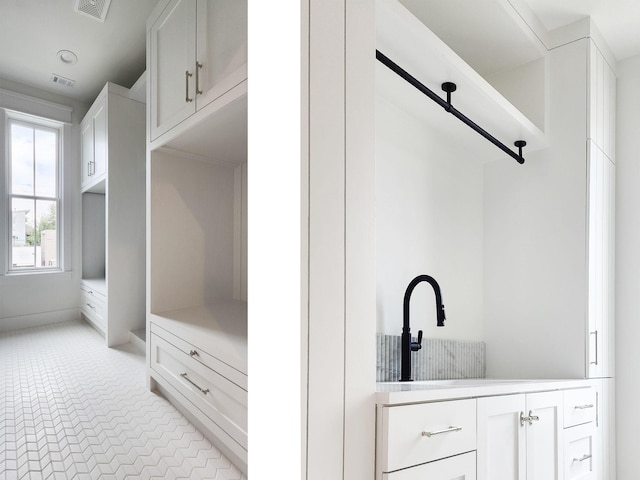 2708 Morrison St, Houston, TX 77009 - mudroom featuring light tile patterned floors