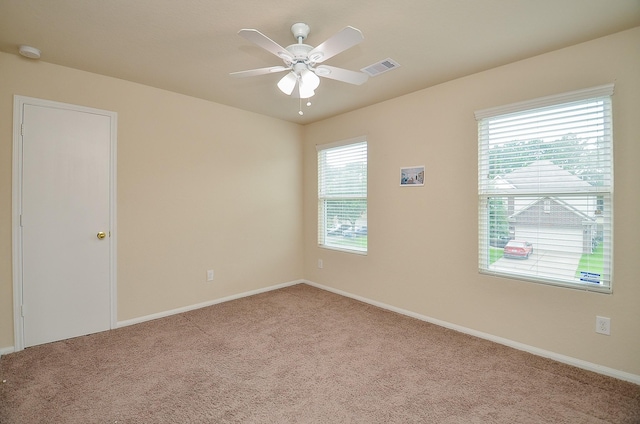 19038 Winding Stream Ln, Houston, TX 77084 - empty room with a smoke detector, carpet, and ceiling fan