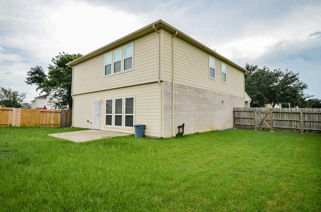 19038 Winding Stream Ln, Houston, TX 77084 - rear view of property featuring brick siding and a fenced backyard