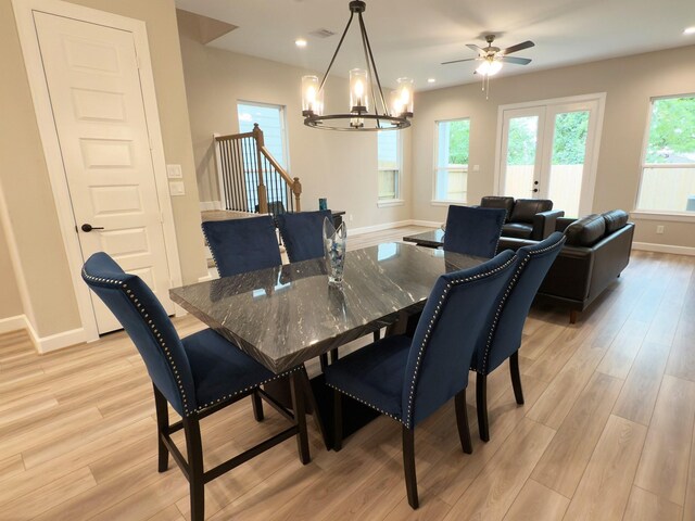 4307B Dickson St, Houston, TX 77007 - dining area featuring a chandelier, light wood finished floors, recessed lighting, stairs, and a ceiling fan
