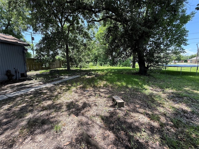 1637 15th St, Port Arthur, TX 77640 - view of yard with a trampoline