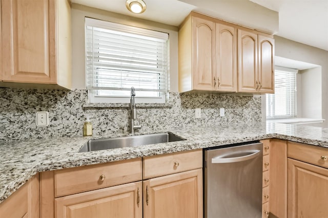 3313 Park Dale Dr, Deer Park, TX 77536 - kitchen with light brown cabinetry, dishwasher, and backsplash