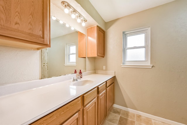3313 Park Dale Dr, Deer Park, TX 77536 - bathroom with vanity, tile patterned floors, and a textured wall